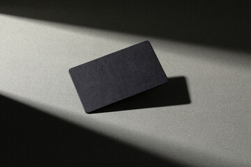 Premium Black Business Cards Mockup with Shadows on gray background