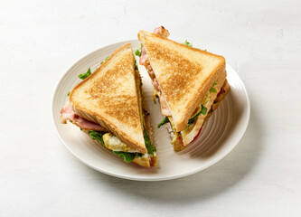 club sandwich on white plate