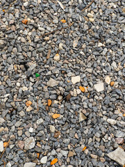 A close up of a pile of gravel on the ground