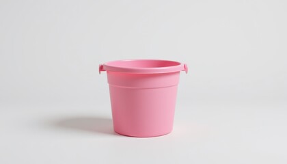 Creative use of a pink bucket home decor product photography minimalist setting top view versatile storage concept