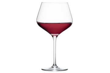 Crimson Elegance A wine glass filled with a deep red liquid against a stark black backdrop