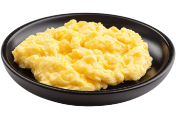 Golden scramble A plate of fluffy yellow scrambled eggs perfectly cooked  presented