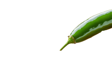 Green chilis bold statement against a black void vibrant and daring