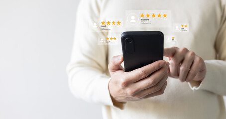close up customer man  hand hold smartphone to read comment on travel website and check survey online from office and give excellent rate for business lifestyle concept