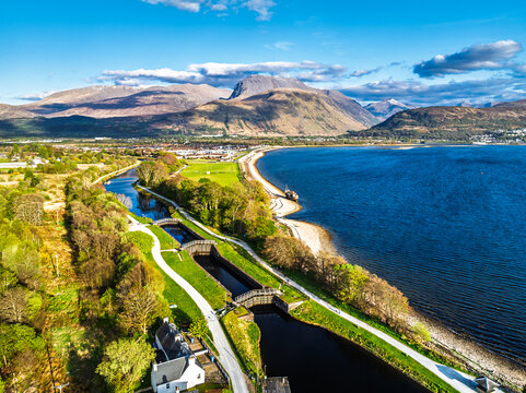 View of Caledonian Canal, Caol Beach and Nevis Range Mountains from a drone, Corpach, Fort William, Highland, Scotland
