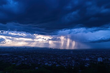 Fototapeta premium Dramatic storm clouds with sun rays over city skyline at dusk