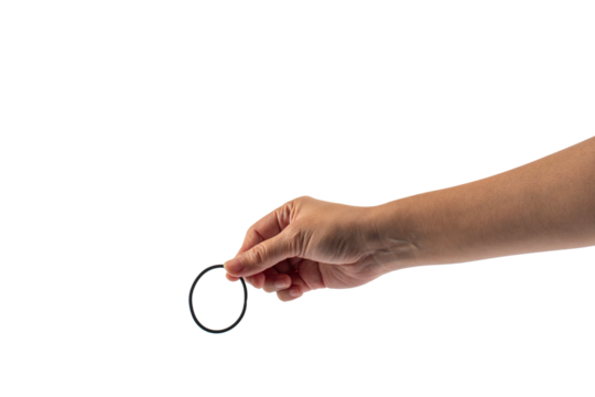 Black rubber band in hand isolated on transparent background
