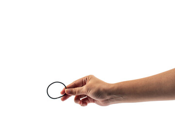 Black rubber band in hand isolated on transparent background