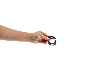 Black rubber band in hand isolated on transparent background