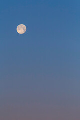 view on Moon in clear blue sky