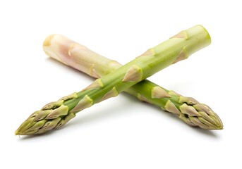 Two asparagus spears crossed on a white background creating an x shape in a studio shot view top