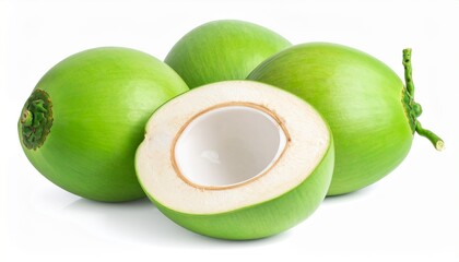 Green coconuts, one cut open to show the white flesh, sit together on a surface.