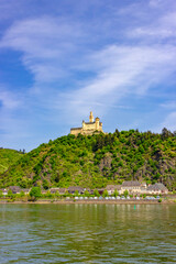 View of Marksburg (Marks Castle) on a hill with the town of Braubach along the Rhine River, Germany