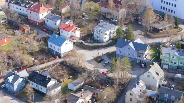 Nordic houses on a hill and the lake. View of Pispala and H&auml;rm&auml;l&auml; regions in Tampere Finland. 4K dronefootage in prores. PIspala is an important cultural hub in Europe and Finland.