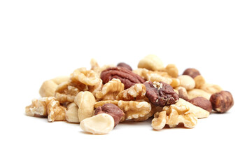 A close-up of assorted nuts including walnuts, pecans, hazelnuts, cashews, and macadamia nuts arranged on a white surface, highlighting textures