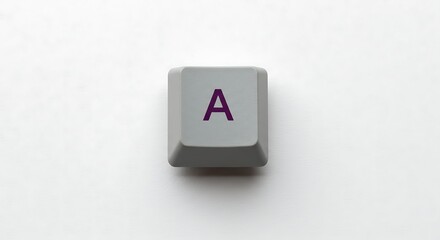 Keyboard key 'A' on white background, close-up