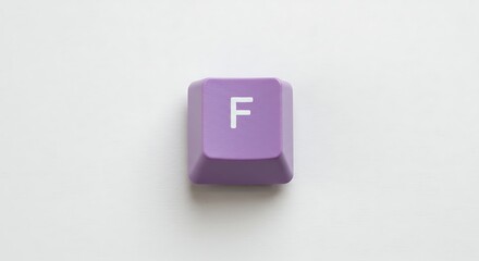 Purple keyboard key with the letter F on white background
