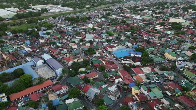 Marikina City overhead view showing dense housing, narrow roads, and trees spread throughout, dense Philippine city textured backdrop