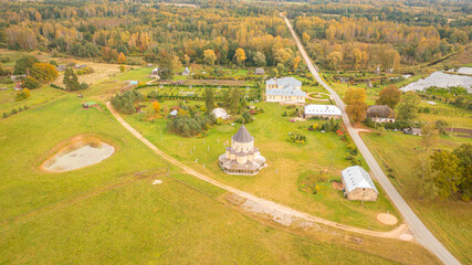 Aerial photo from drone to Brukna Manor and church on a beautiful autumn day. Brukna , bauska, Latvia. (Series)
