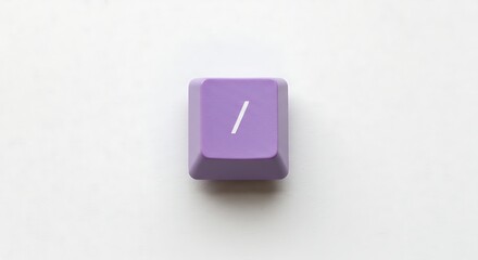 Purple keyboard keycap with slash on white background