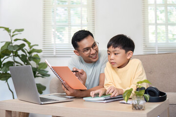 Homeschooling support from father to son in a casual setting