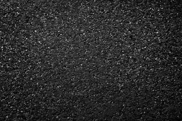 Obraz premium Black Asphalt texture. Background texture of dark gray asphalt, top view