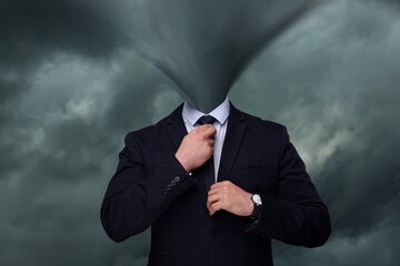 Businessman with tornado instead of head against cloudy sky. Mental health