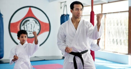 Sensei, lesson and man with kids in karate class, self defense training or martial arts with youth...