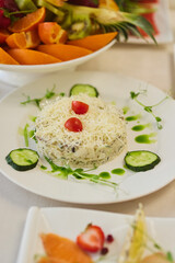 Setting the festive table. Meat salad with cheese