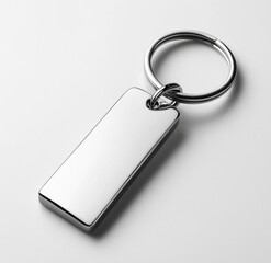 Fototapeta premium Sleek silver rectangular keychain with a circular ring