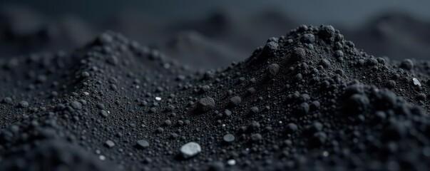 Close-up of coarse black sandpaper, gritty texture , detail, dark grey, rough