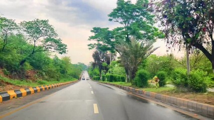 Pakistan murre road and  Asphalt road in World, Alps in a beautiful summer day, Hochalpenstrasse, Driving car on a mountain road. Ahead is a green forest and mountain nature landscape in summer.
