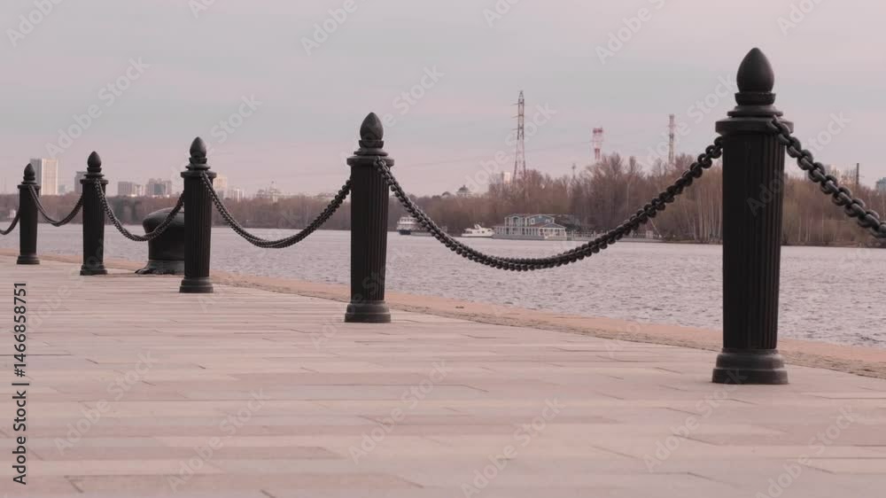 Aufkleber exploring a tranquil riverside walkway with picturesque views and serene atmosphere during a calm af