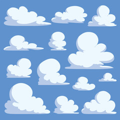 Fluffy white clouds float serenely against a clear blue sky.