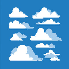Fluffy white clouds floating in a bright blue sky.