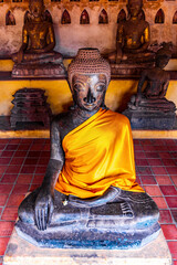 Wat Si Saket buddha temple with buddha statues in Vientiane Laos.