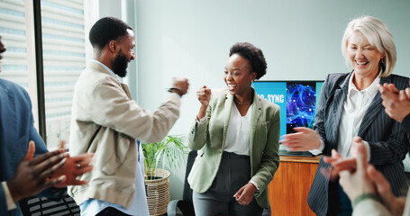 Applause, colleagues and people with smile, meeting and fist bump for celebration, business and laughing. Group, clapping and happy for achievement in boardroom, good news and excited for success