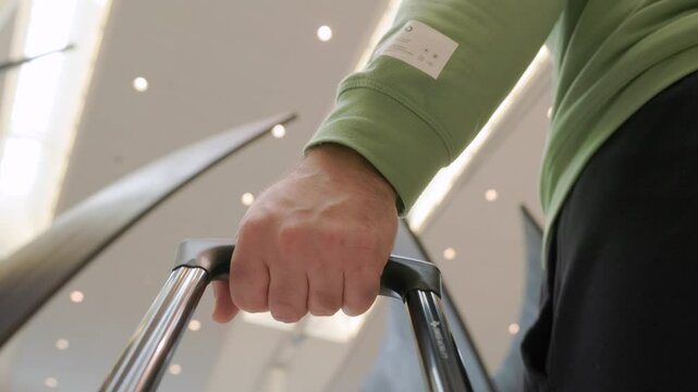 POV shot following a man rolling a suitcase through Toronto Pearson International Airport. Captures the experience of airport travel, terminal navigation, the anticipation of an upcoming journey in 4k