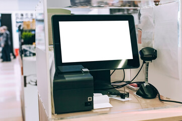 Blank POS terminal with receipt printer at checkout counter.