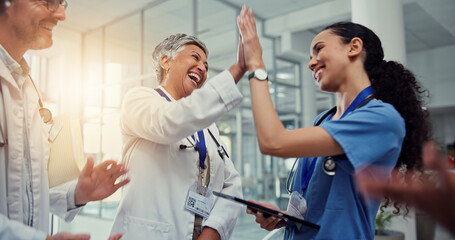 Nurse, doctor and celebration high five with tablet for healthcare excellence, surgery success and...