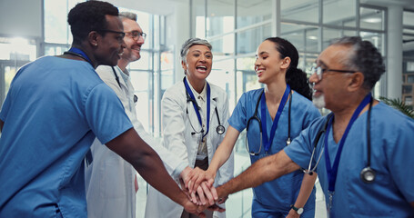Doctors, teamwork and hands together for huddle, motivation or goal success in hospital meeting....