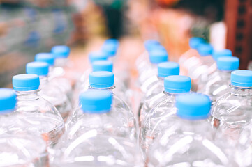 Close-up, bottles of mineral water in a supermarket.