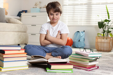 Stubborn kid refusing to read books at home