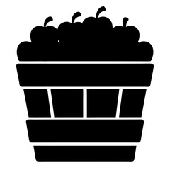 A Black Silhouette Illustration of Apples in a Bushel Basket