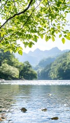 Serene mountain lake scene framed by lush foliage