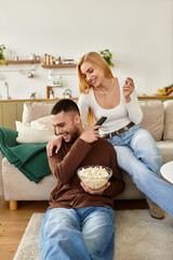 Loving couple sharing joyful moments while enjoying a cozy evening at home together