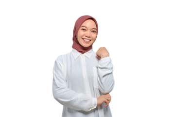 Smiling young Asian Muslim woman looking at camera feeling confident and happy isolated on transparent background