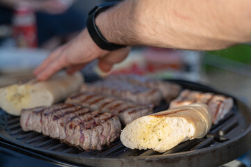 Enjoy Grilling Steak and Delicious Bread Outdoors for a Perfect Dining Experience