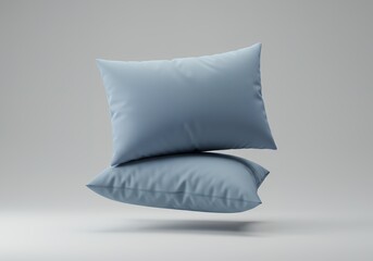 Blue Pillow Stack on Gray Surface