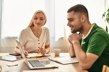 Loving couple enjoying a cozy afternoon together while working at home